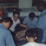 Navy friends praying during Bible study, SF, CA